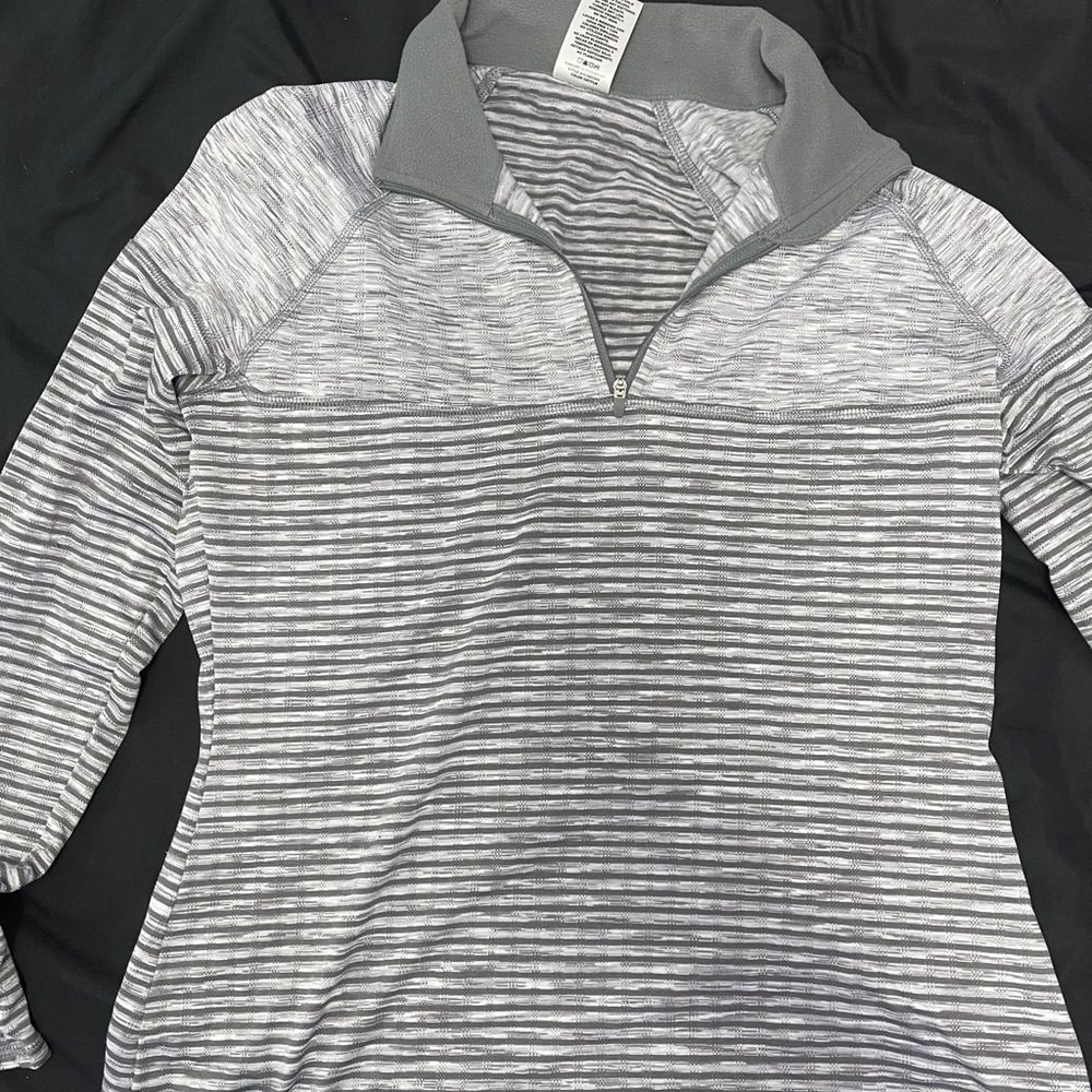grey and white quarter zip